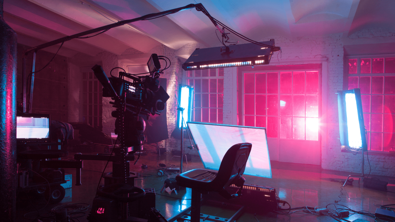 A studio with pink lighting